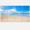 Designart - Large Clouds Over Calm Beach - Seashore Photo Canvas Print